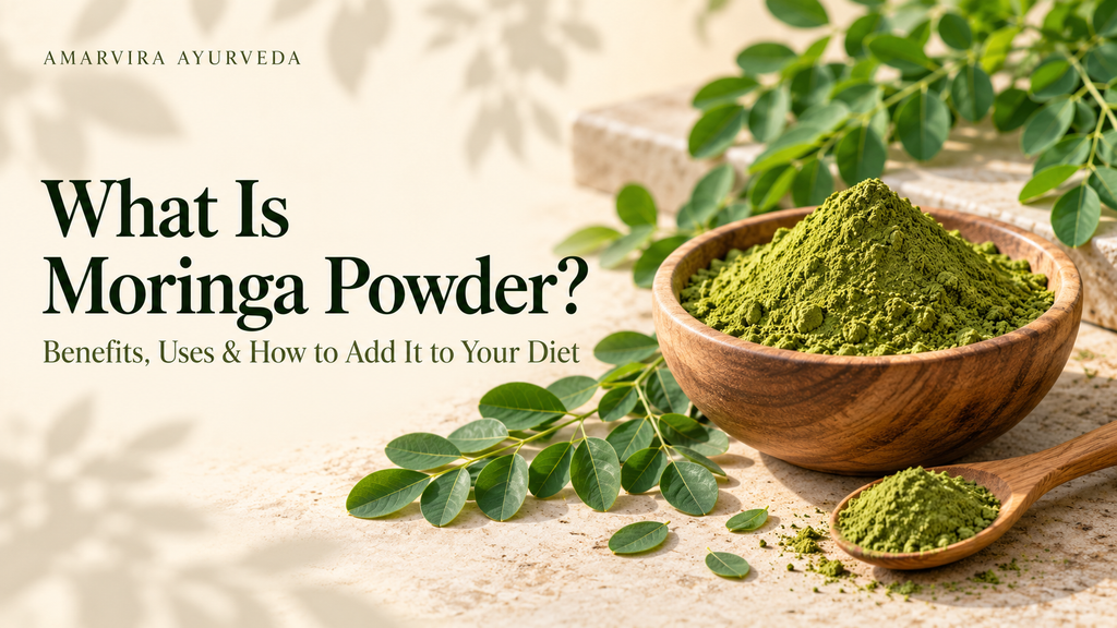 Moringa powder in a wooden bowl with fresh leaves, titled “What Is Moringa Powder? Benefits, Uses & How to Add It to Your Diet” by Amarvira Ayurveda.